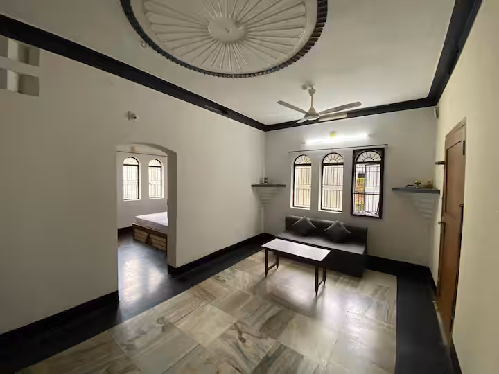 Bright sitting area with traditional window details