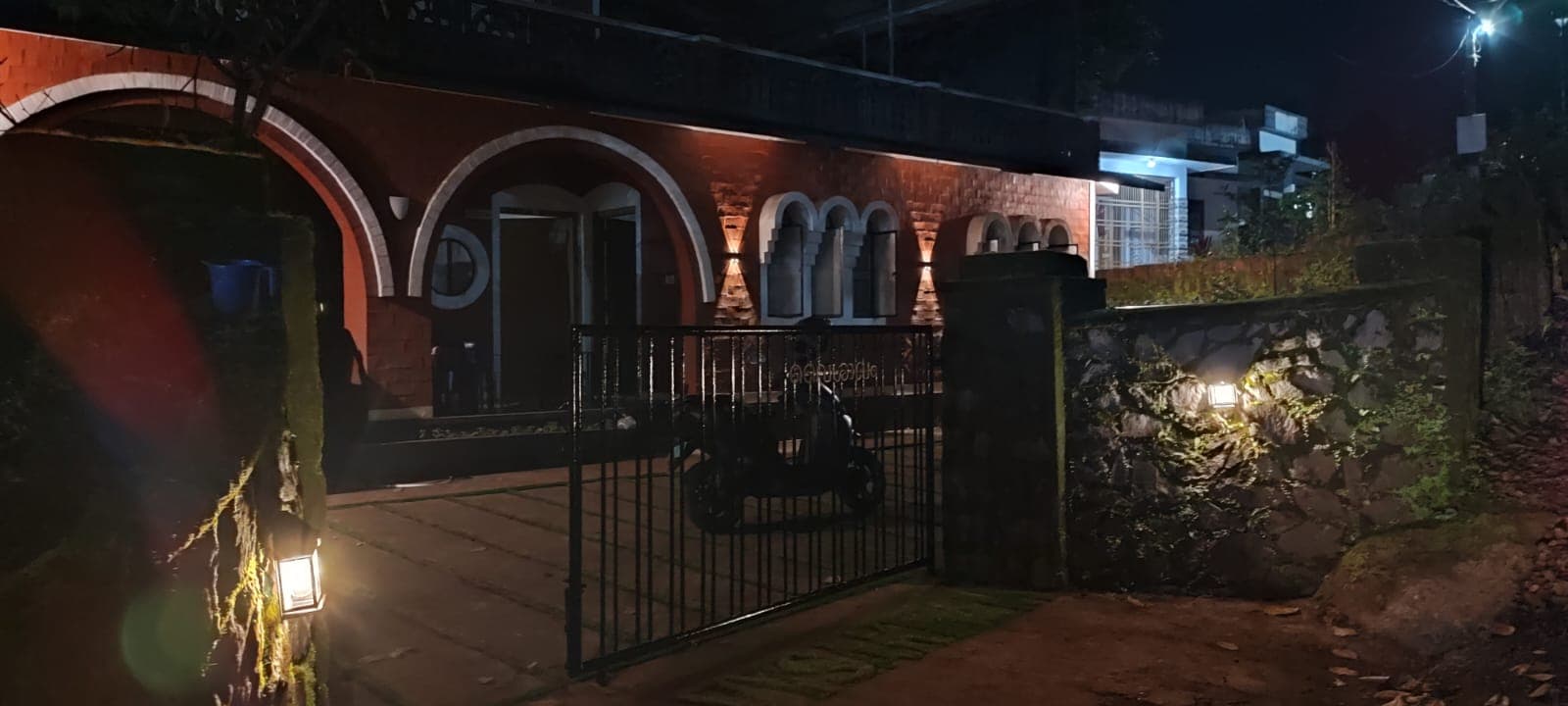 Evening lights at the entrance of Vysakham Heritage