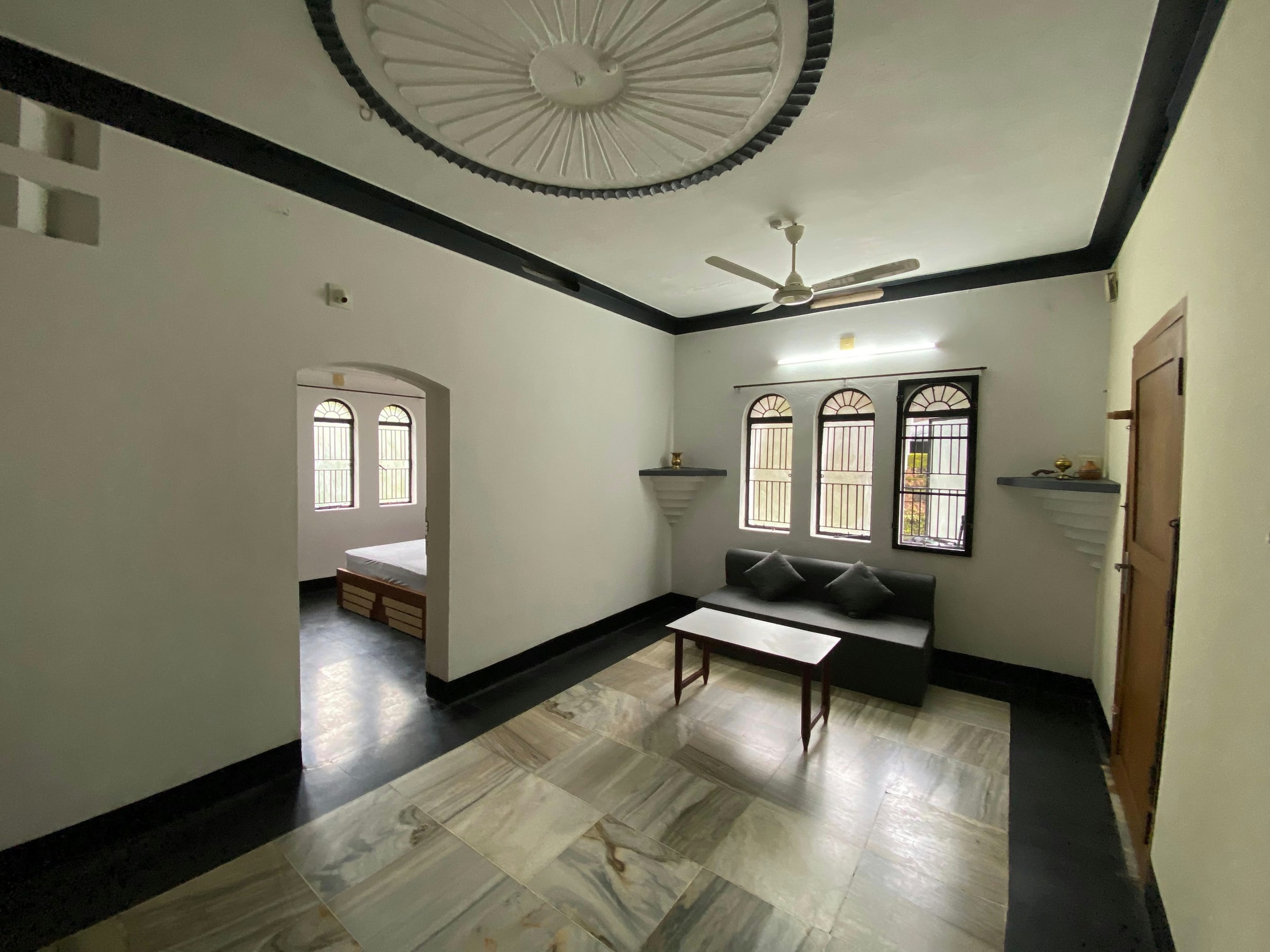 Bright sitting area with traditional window details